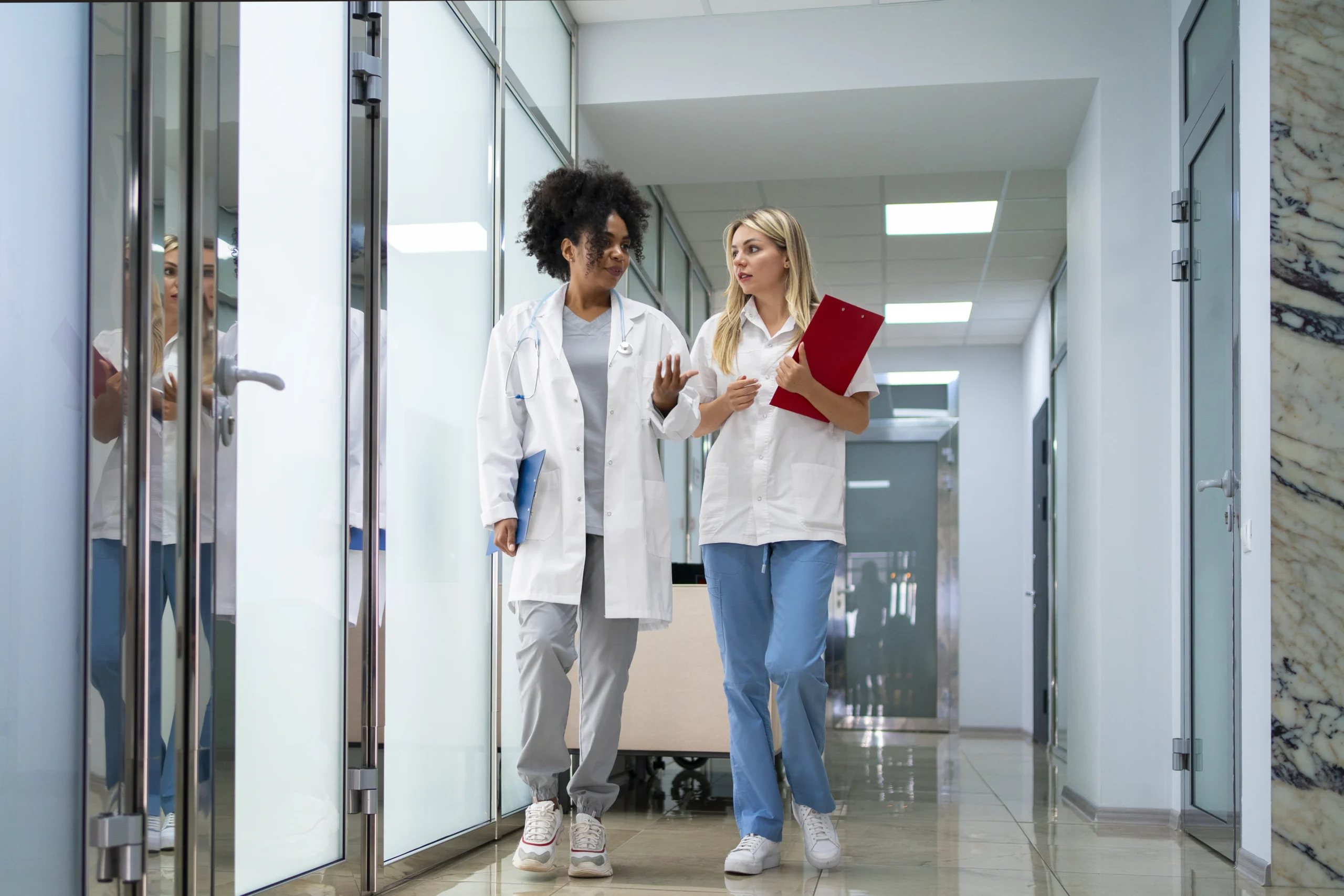 Modern clinic consultation room featuring switchable smart glass partitions
